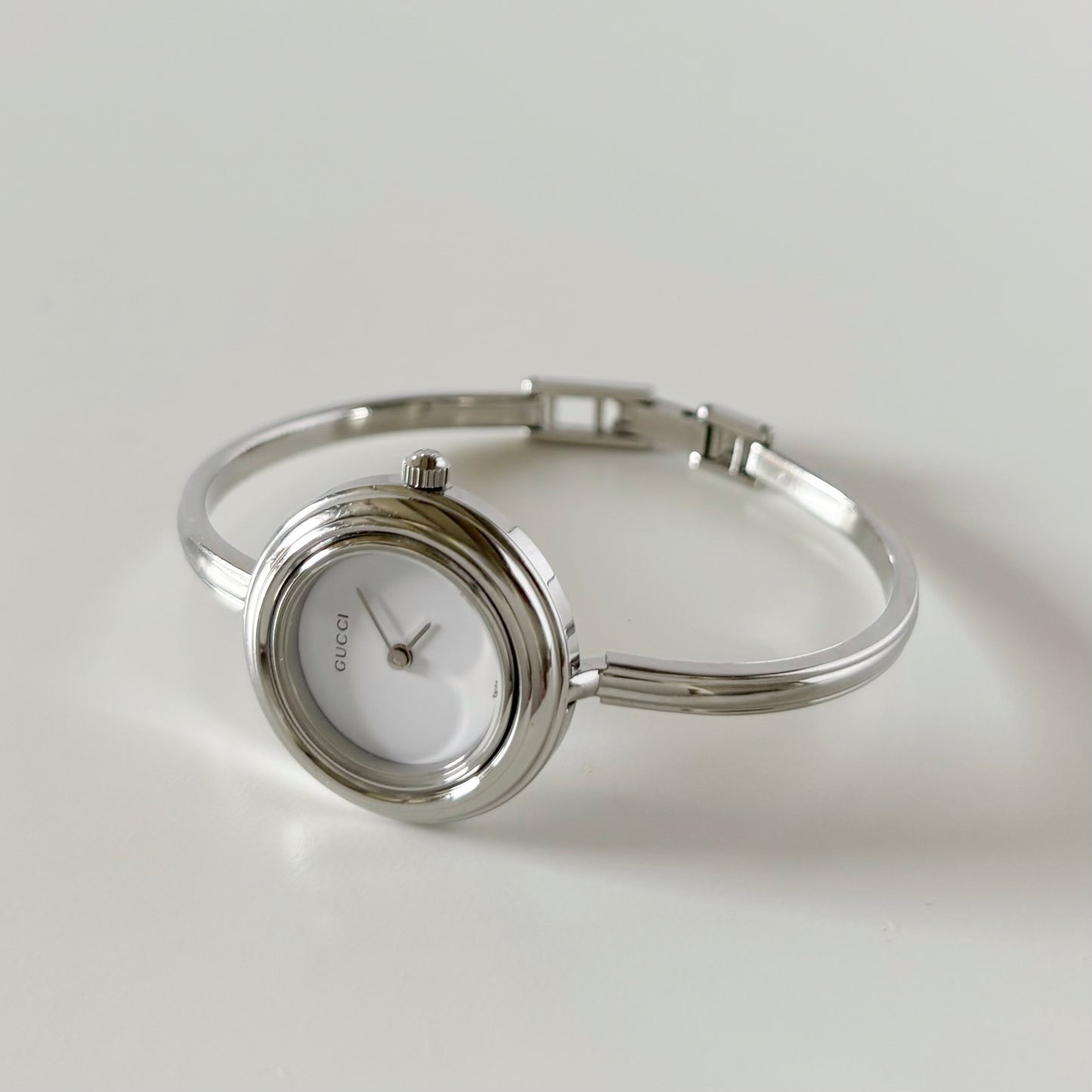Gucci 1990s Interchangeable Bezel Stainless steel Bangle Watch with 12 bezels, case