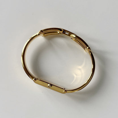 Gucci 1990s Seashell Rectangular Dial Gold Plated Bangle Watch