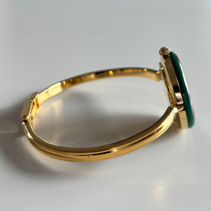 Gucci 1990s Interchangeable Bezel Gold Plated Bangle Watch with 12 bezels, case