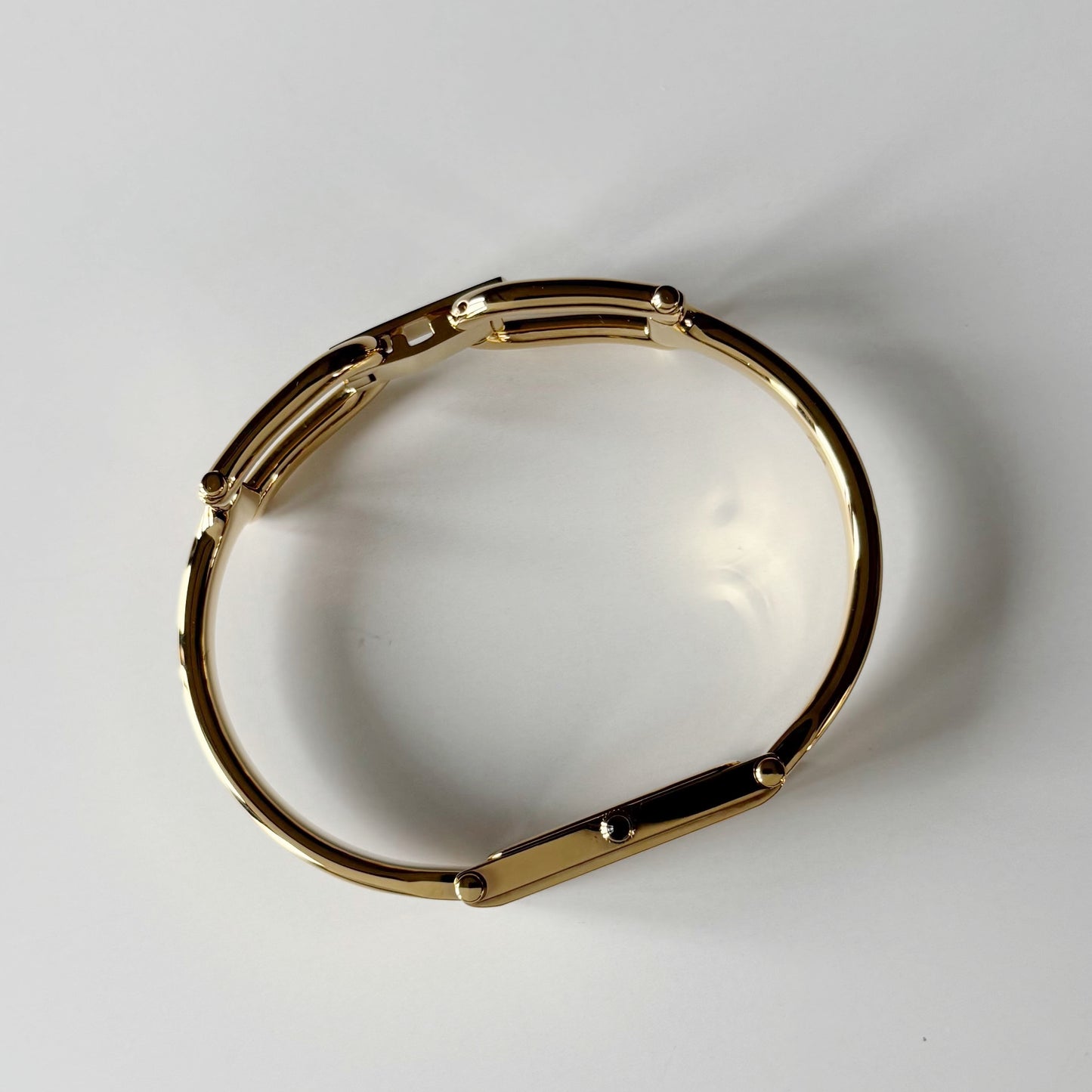 Gucci 1990s Seashell Rectangular Dial Gold Plated Bangle Watch