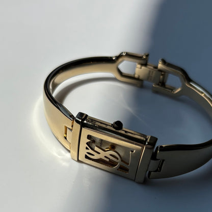 Yves Saint Laurent 1990s Peek a boo Gold Plated Bangle Watch