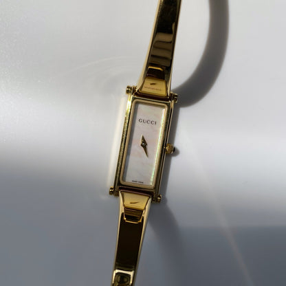 Gucci 1990s Seashell Dial Rectangular Gold Plated Bangle Watch