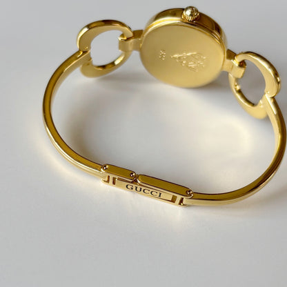 Gucci 1990s Seashell Oval Dial Gold Plated Bangle Watch (Small)