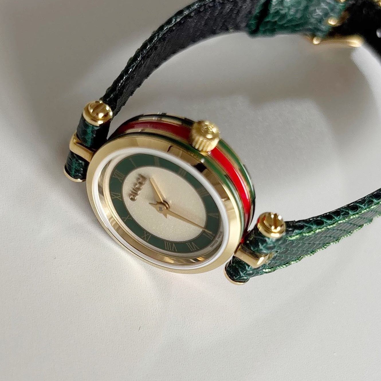 Gucci 1990s Round Dial Green Gold Plated Watch