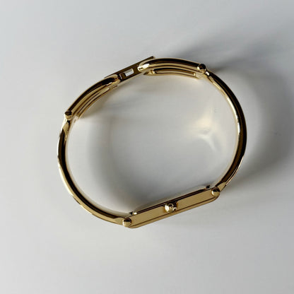 Gucci 1990s Rectangular Gold Dial Gold Plated Bangle Watch (Small)