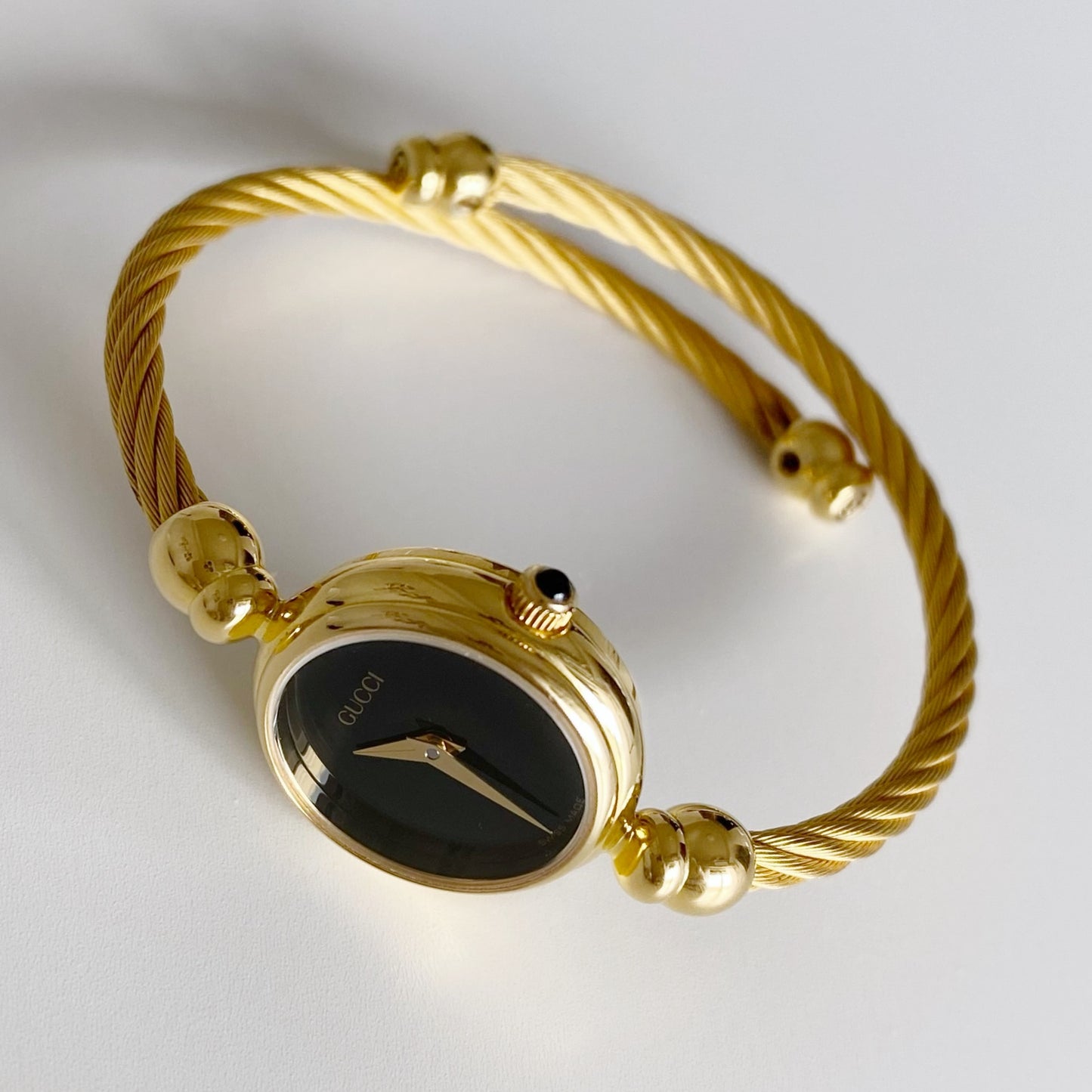 Gucci 1990s Black Dial Gold Plated Bangle Watch