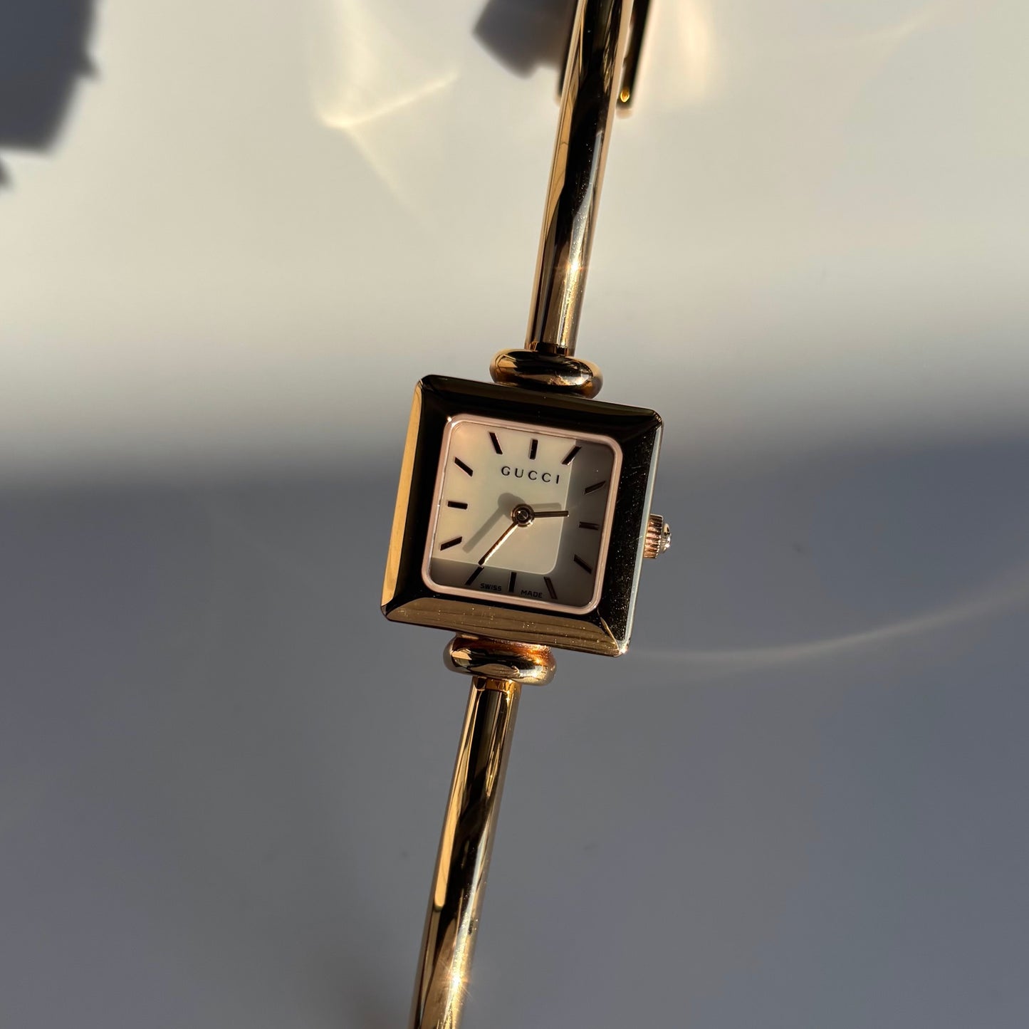 Gucci 1990s Seashell Square Dial Gold Plated Bangle Watch