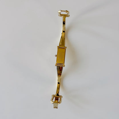 Gucci 1990s Rectangular Gold Dial Gold-Plated Watch