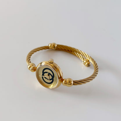 Gucci 1990s Gold Plated Cable Bangle Watch