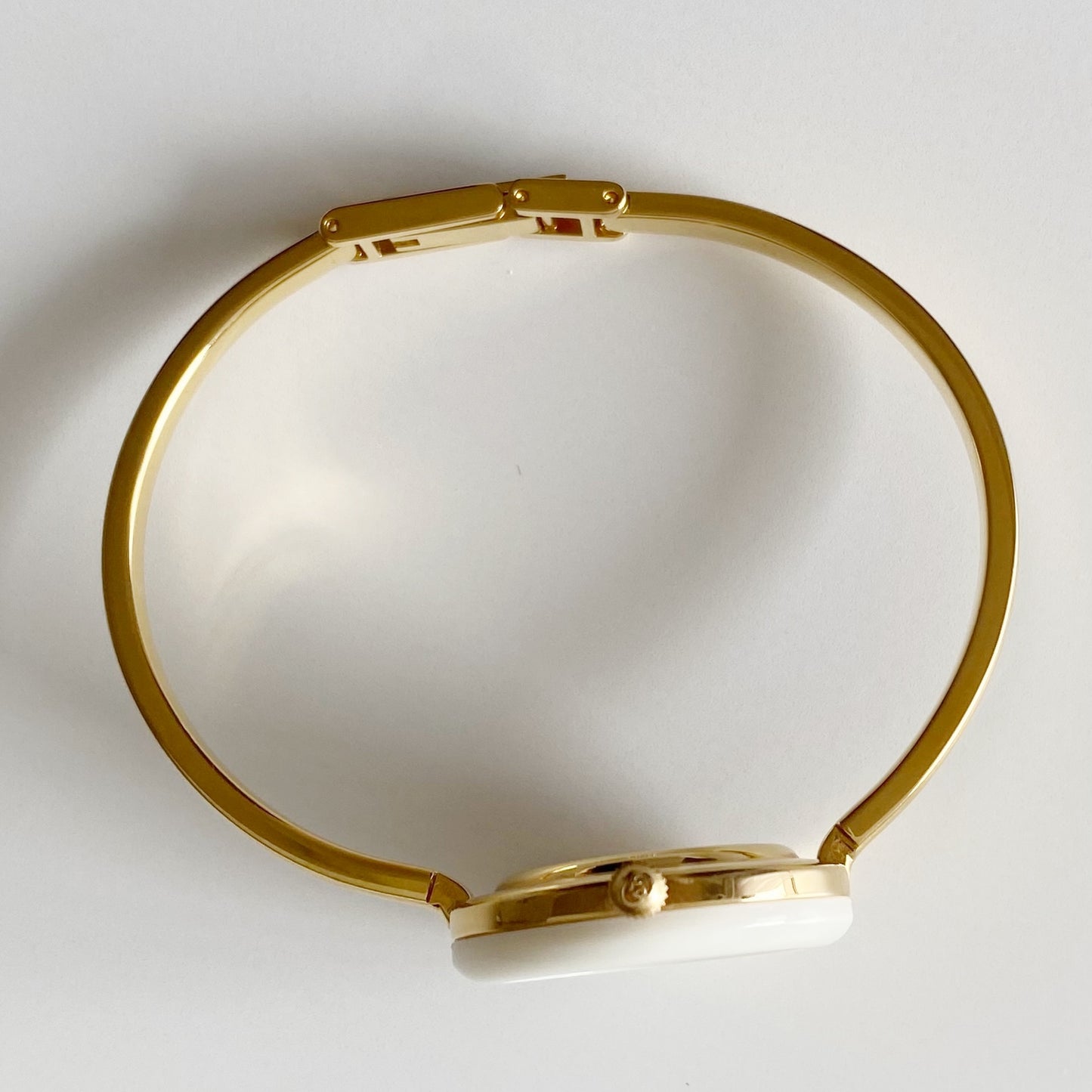 Gucci 1990s Interchangeable Bezel Gold Plated Bangle Watch with 12 bezels, case