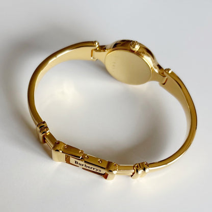 Burberry 1990s Round Dial Gold Plated Bangle Watch