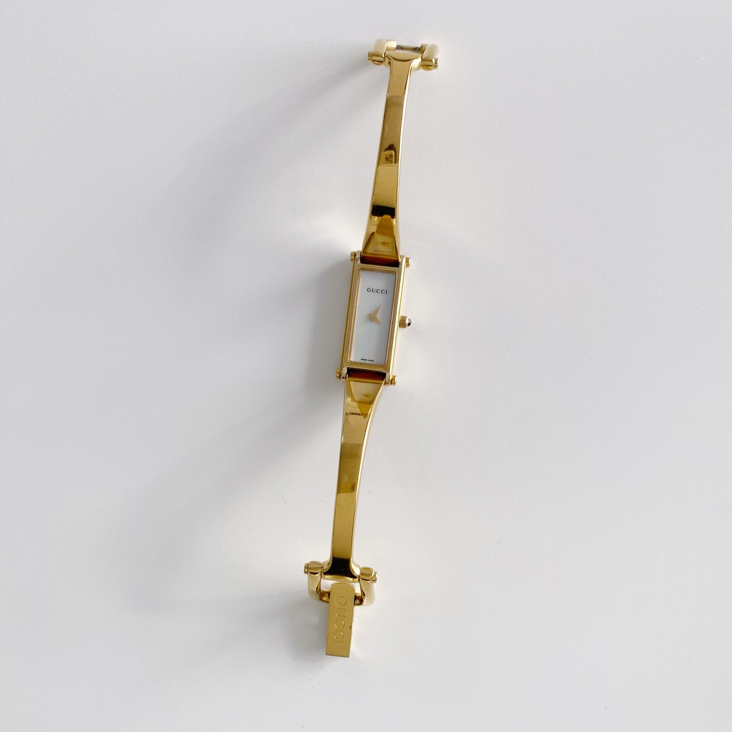 Gucci 1990s Seashell Dial Rectangular Gold Plated Bangle Watch