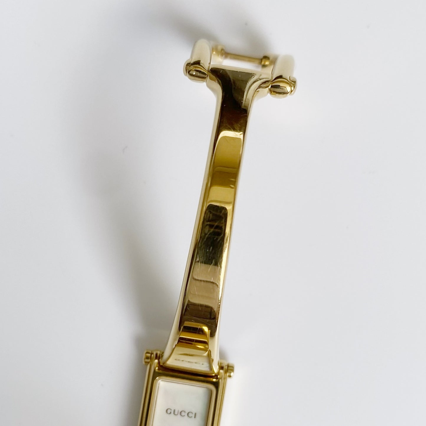 Gucci 1990s Seashell Dial Rectangular Gold Plated Bangle Watch