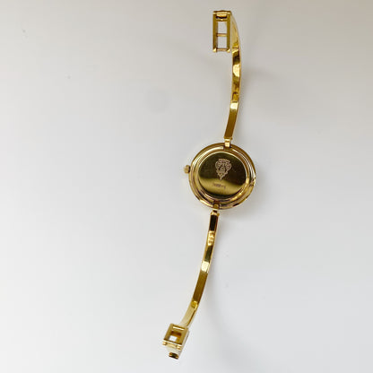 Gucci 1990s Interchangeable Bezel Gold Plated Bangle Watch with 12 bezels, case