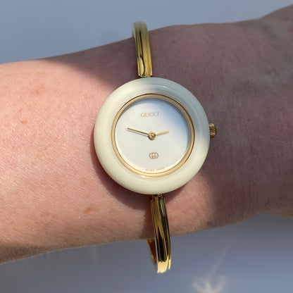 Gucci 1990s Interchangeable Bezel Gold Plated Bangle Watch with 12 bezels, case