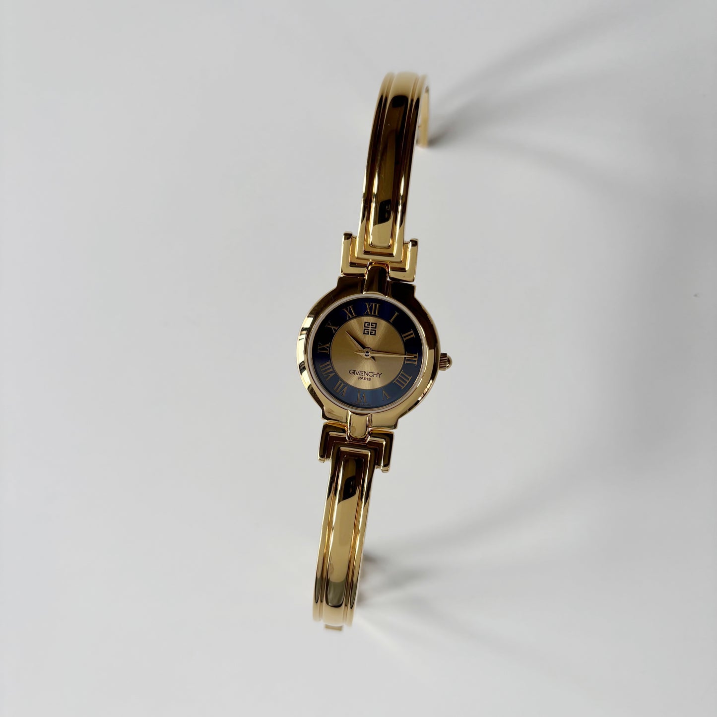 Givenchy 1990s Round Dial Gold Plated Bangle Watch