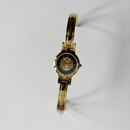 Givenchy 1990s Round Dial Gold Plated Bangle Watch