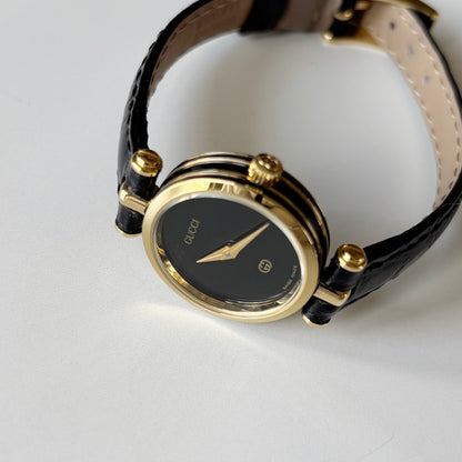 Gucci 1980s Black Dial Round Gold-Plated Watch