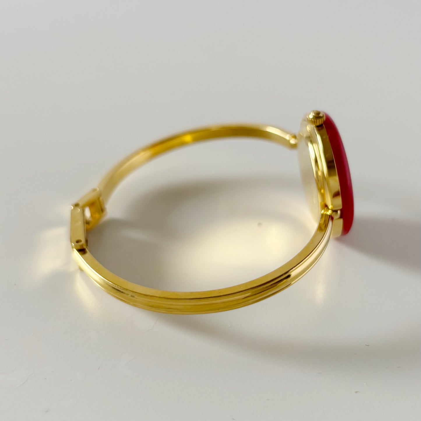 Gucci 1990s Interchangeable Bezel Gold Plated Bangle Watch with 12 bezels, case