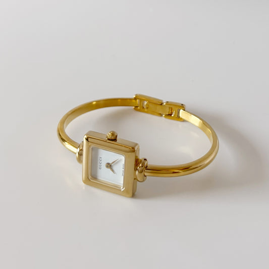 Gucci 1990s Square Dial Gold Plated Bangle Watch