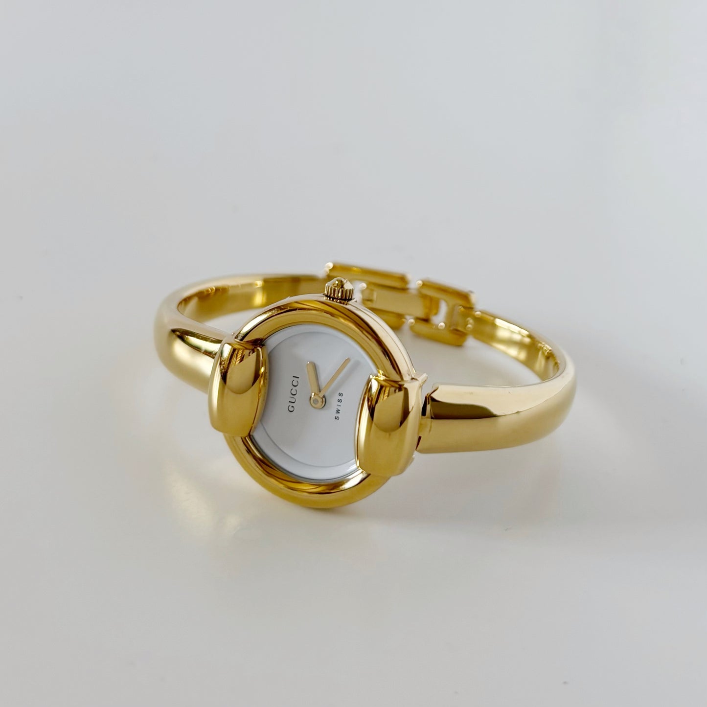 Gucci 1990s Round Dial Gold Plated Bangle Watch (Small)