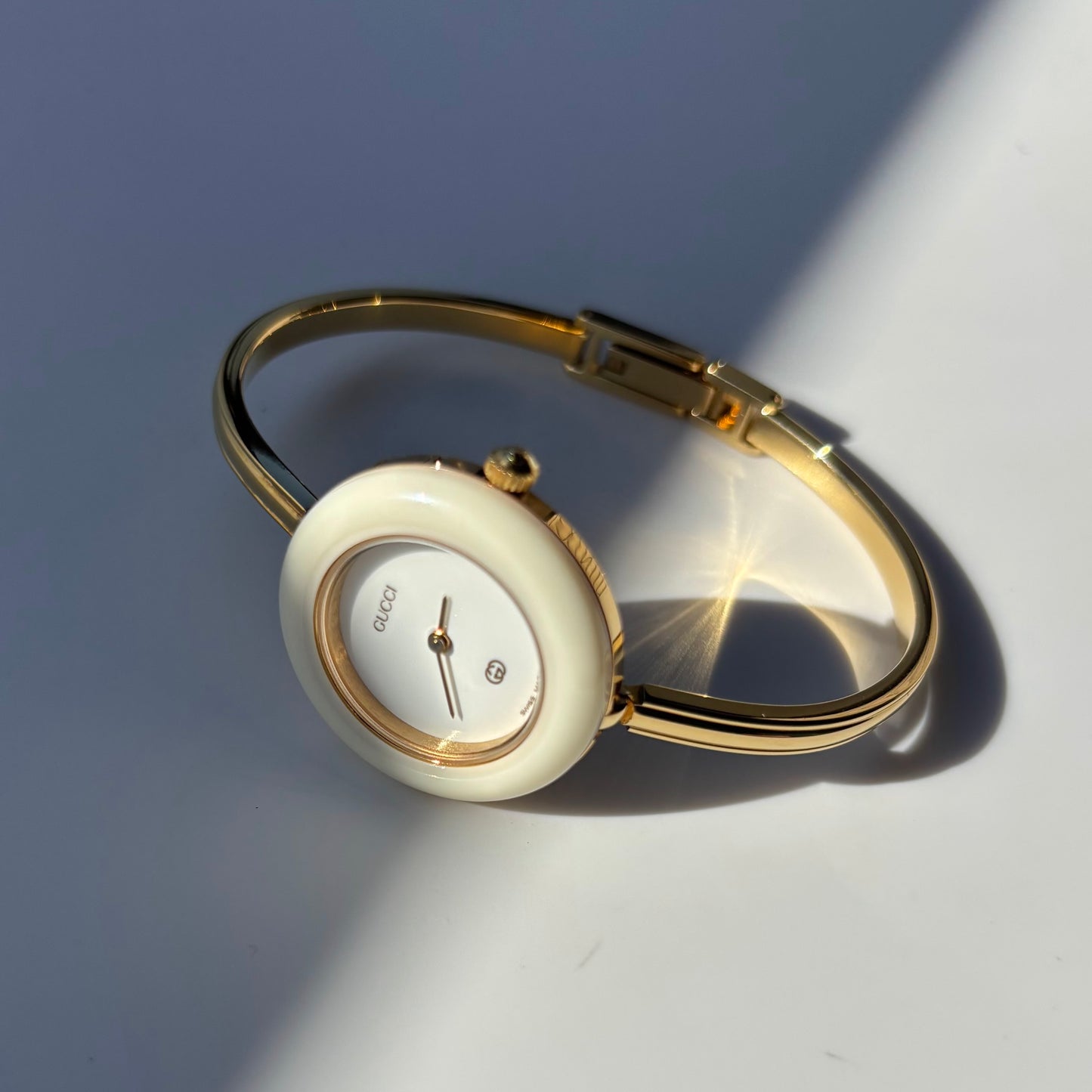 Gucci 1980s Interchangeable Bezel Gold Plated Bangle Watch with 12 bezels, case