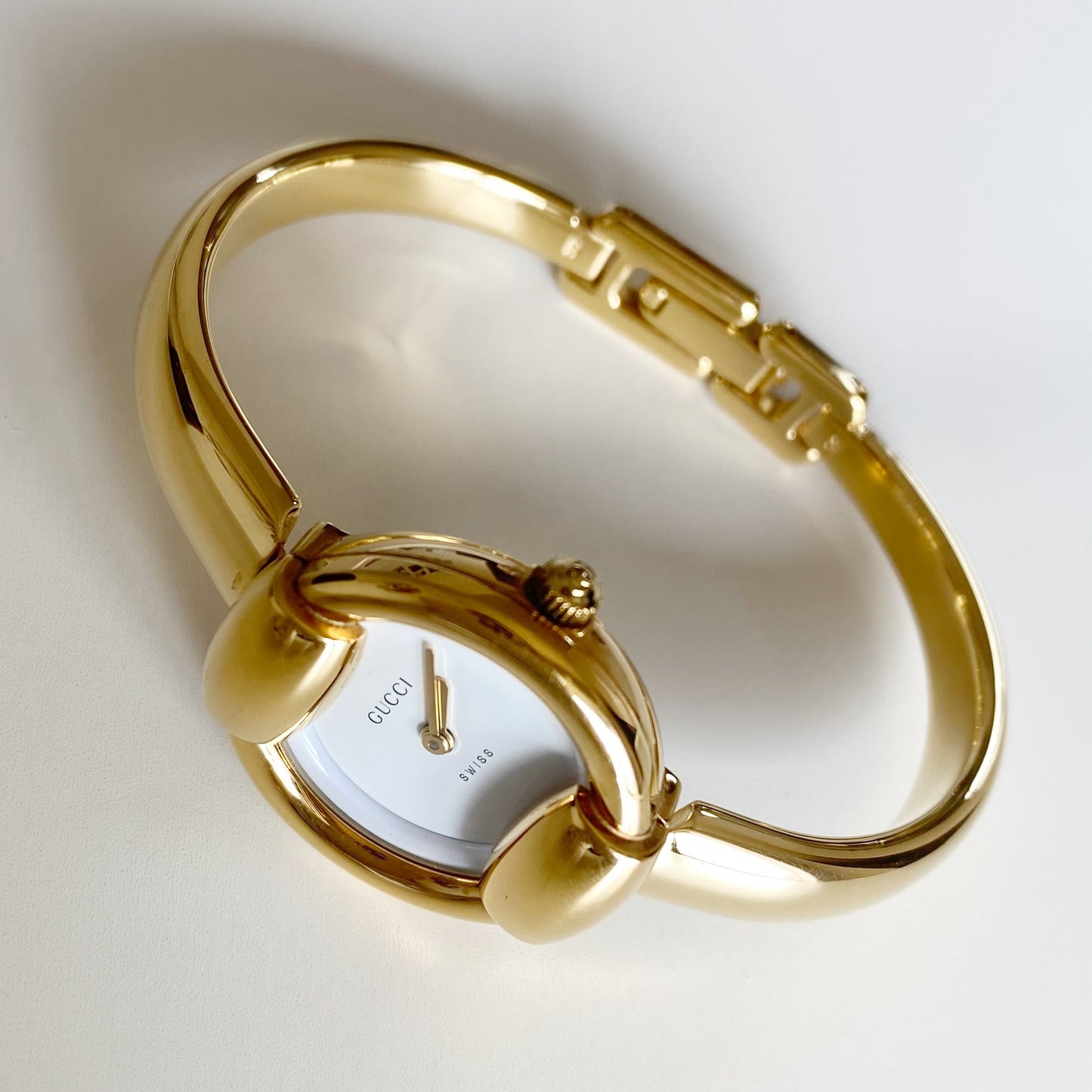 Gucci 1990s Round Dial Gold Plated Bangle Watch