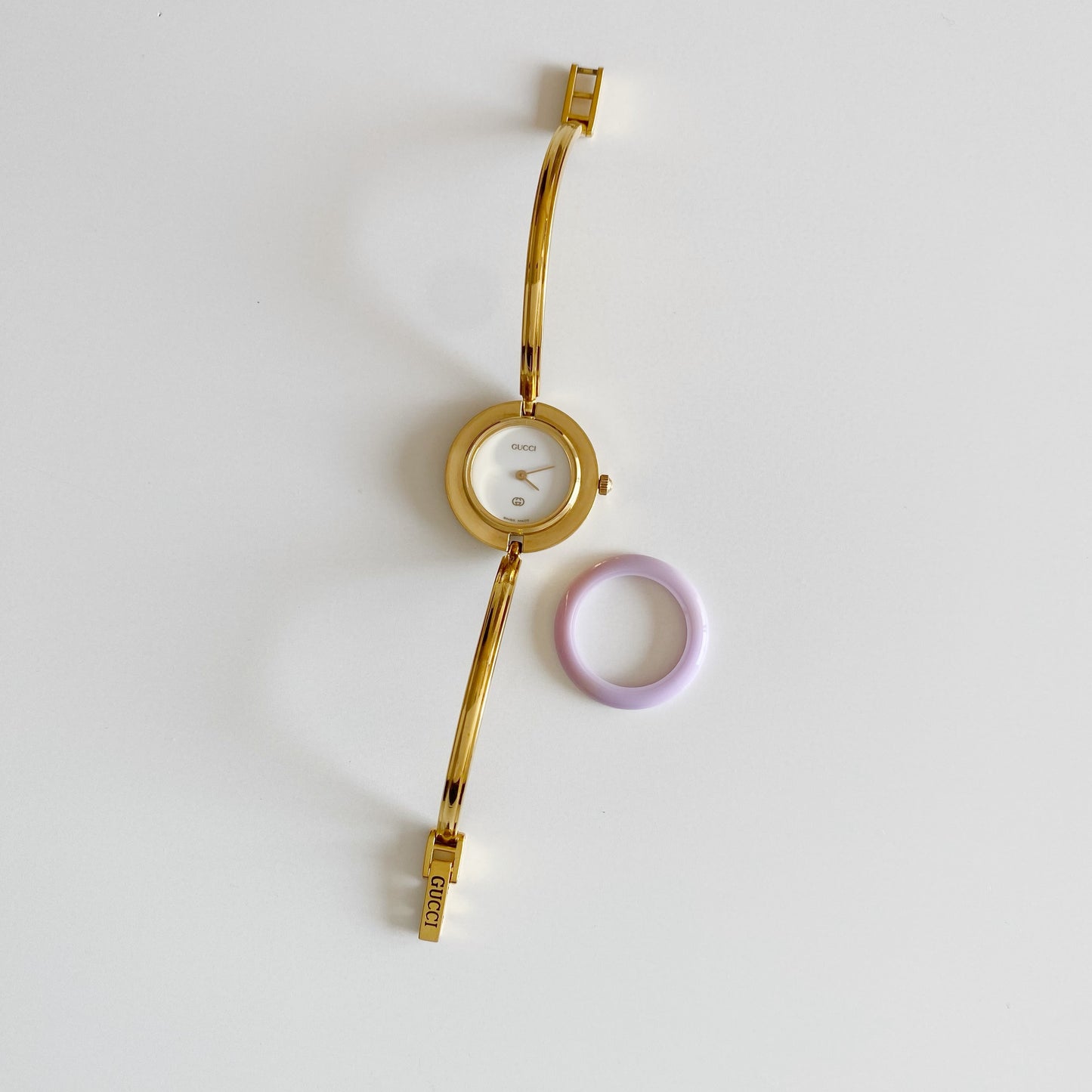 Gucci 1990s Interchangeable Bezel Gold Plated Bangle Watch with 12 bezels, case