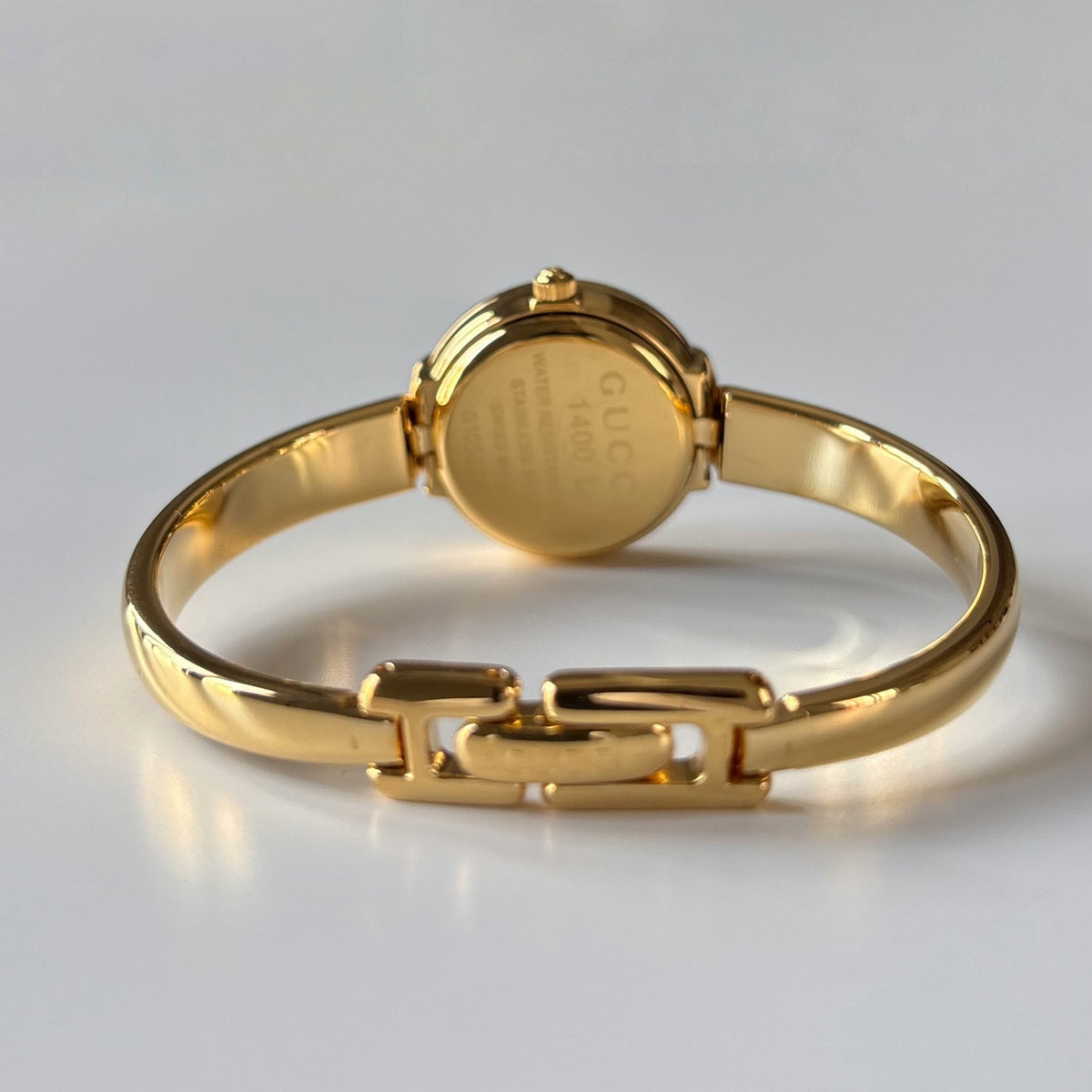 Gucci Round Dial Gold-Plated Bangle Watch
