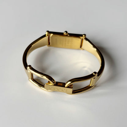 Gucci 1990s Gold Rectangular Dial Gold Plated Bangle Watch (Small)