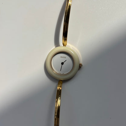 Gucci 1990s Interchangeable Bezel Gold Plated Bangle Watch with 12 bezels, case