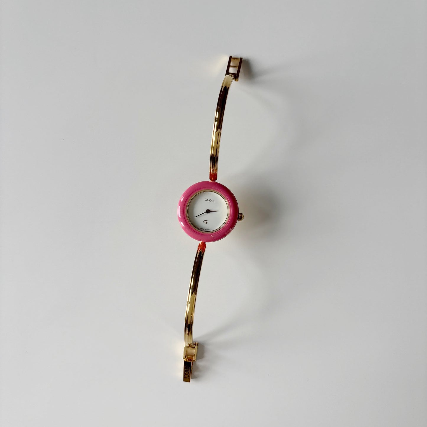 Gucci 1990s Interchangeable Bezel Gold Plated Bangle Watch with 12 bezels, case