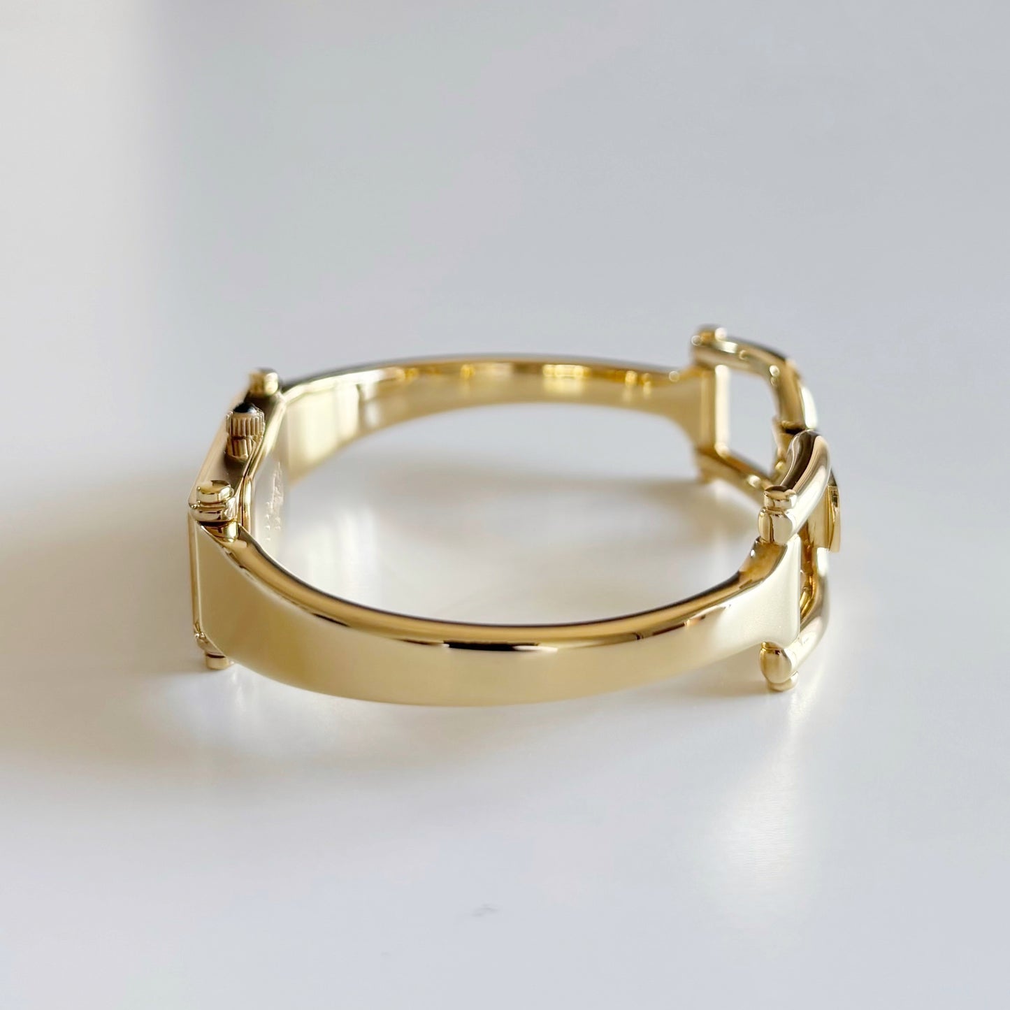 Gucci 1990s Rectangular Dial Gold Plated Bangle Watch