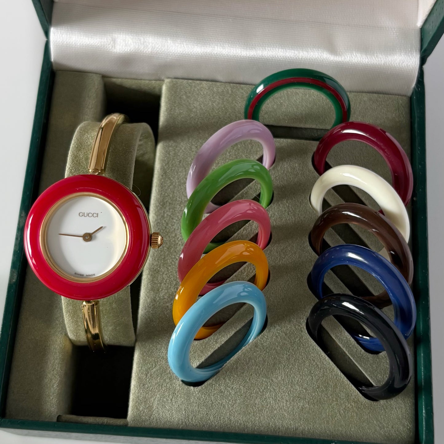 Gucci 1990s Interchangeable Bezel Gold Plated Bangle Watch with 12 bezels, case (Small)