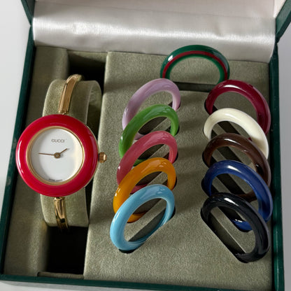 Gucci 1990s Interchangeable Bezel Gold Plated Bangle Watch with 12 bezels, case (Small)