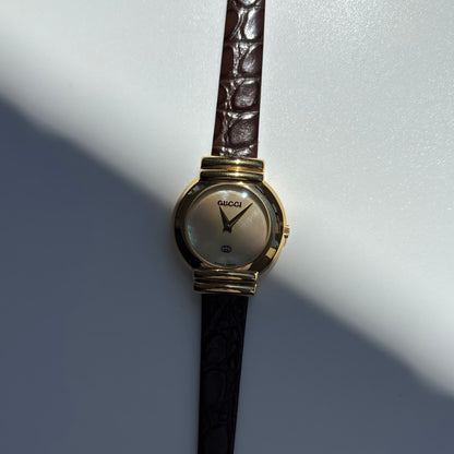 Gucci 1990s Seashell Round Dial Gold Plated Watch