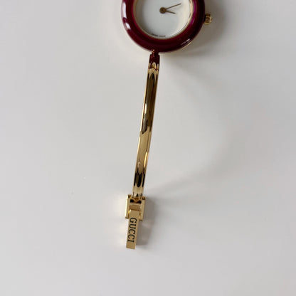 Gucci 1990s Interchangeable Bezel Gold Plated Bangle Watch with 12 bezels, case