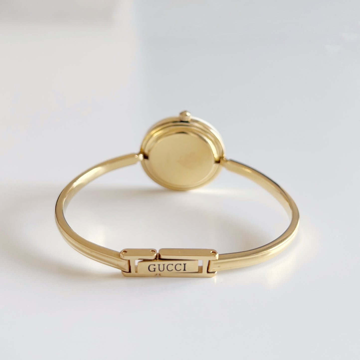 Gucci 1990s Interchangeable Bezel Gold Plated Bangle Watch with 12 bezels, case