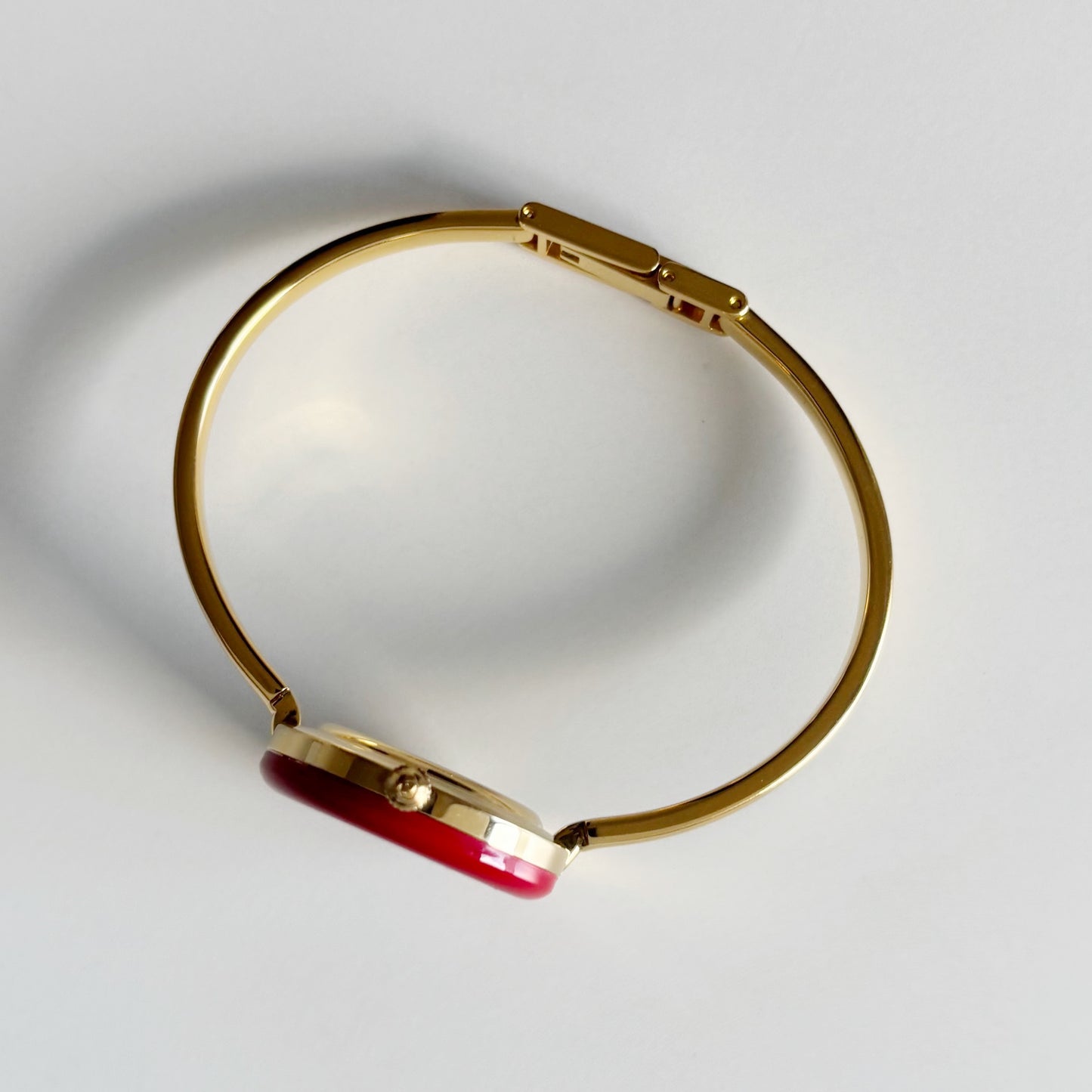Gucci 1990s Interchangeable Bezel Gold Plated Bangle Watch with 12 bezels, case