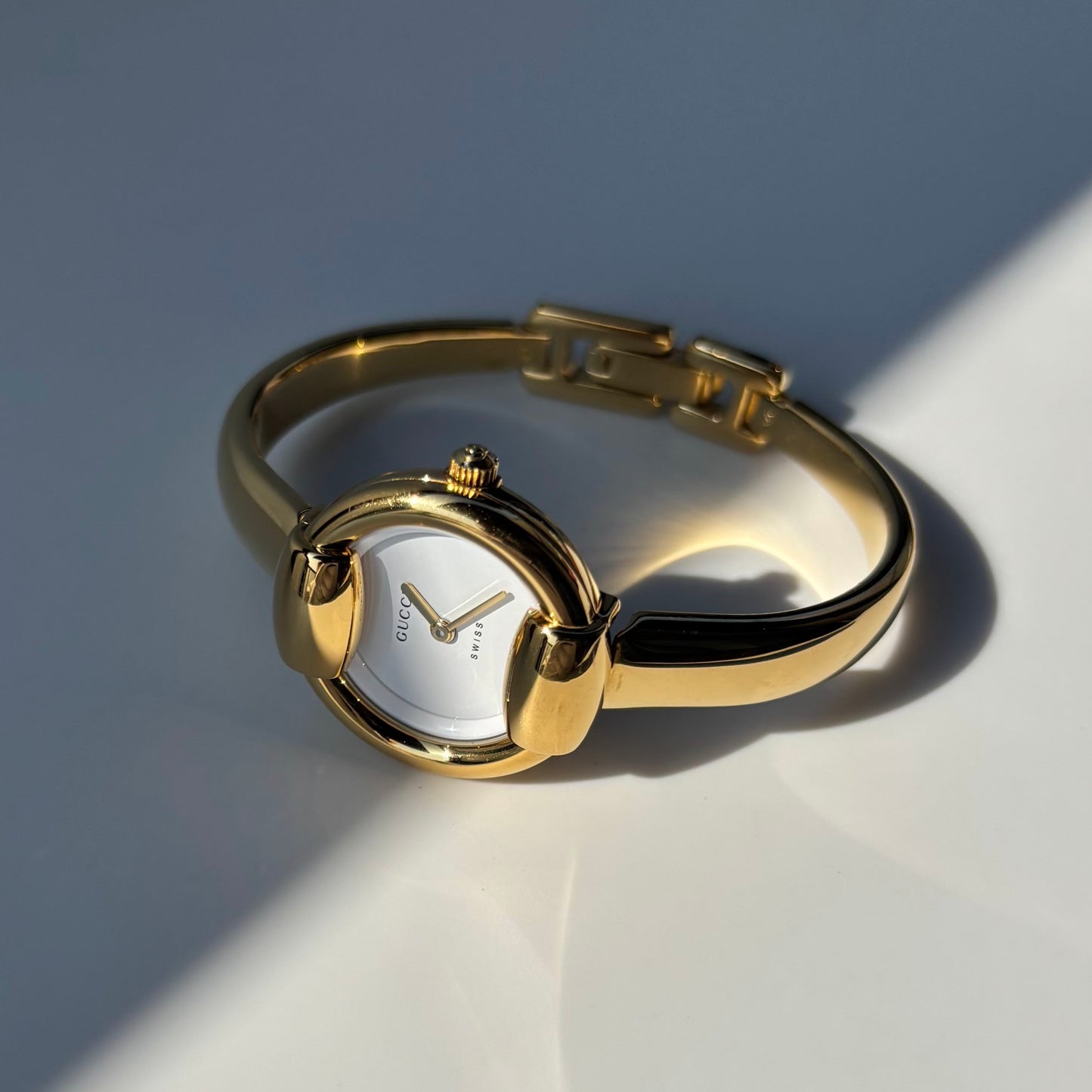 Gucci 1990s Round Dial Gold Plated Bangle Watch (Small)