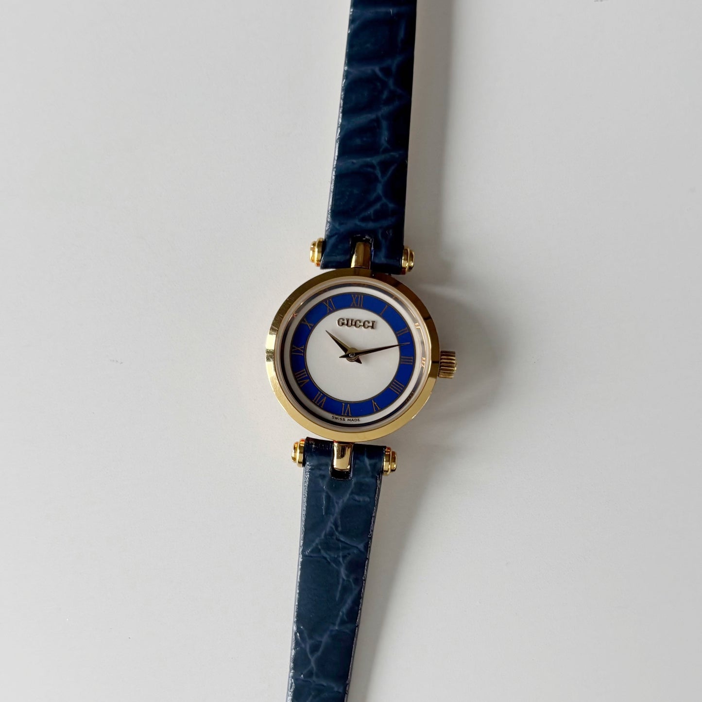 Gucci 1990s Blue Round Dial Gold Plated Watch