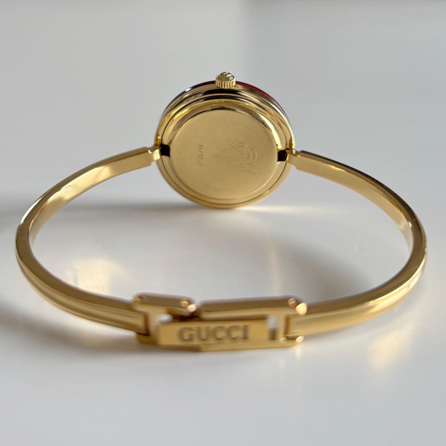 Gucci 1990s Interchangeable Bezel Gold Plated Bangle Watch with 12 bezels, case
