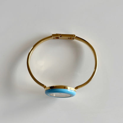 Gucci 1990s Interchangeable Bezel Gold Plated Bangle Watch with 12 bezels, case