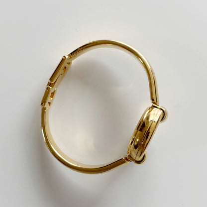 Gucci 1990s Round Dial Gold Plated Bangle Watch (Small)