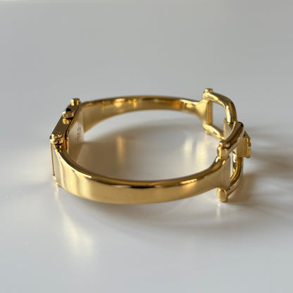 Gucci 1990s Rectangular Gold Dial Gold Plated Bangle Watch