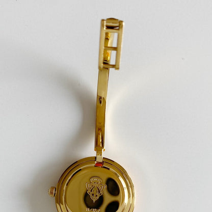 Gucci 1990s Interchangeable Bezel Gold Plated Bangle Watch with 12 bezels, case
