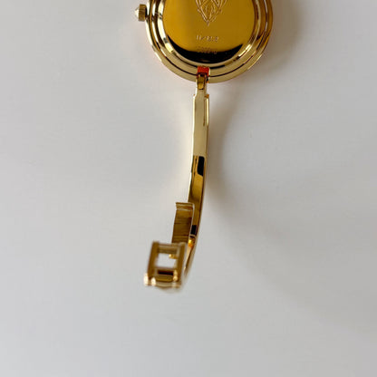 Gucci 1990s Interchangeable Bezel Gold Plated Bangle Watch with 12 bezels, case