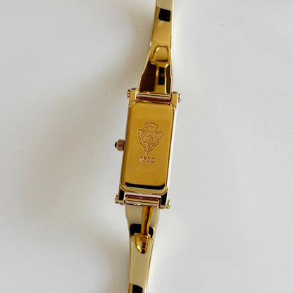 Gucci 1990s Rectangular Dial Gold Plated Bangle Watch