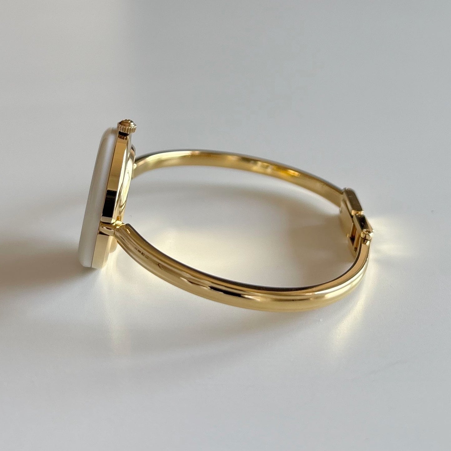 Gucci 1990s Interchangeable Bezel Gold Plated Bangle Watch with 12 bezels, case
