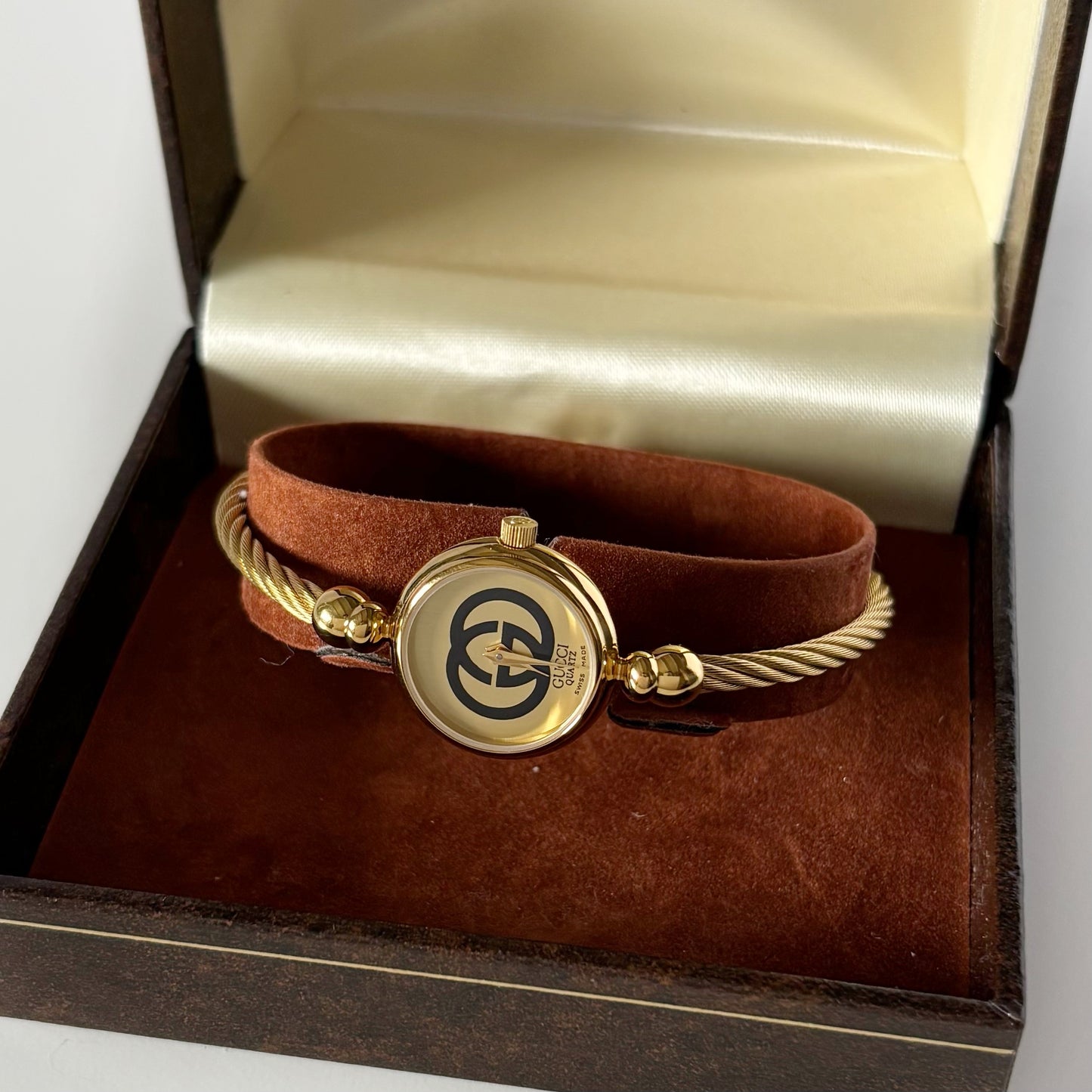 Gucci 1980s Round Dial Cable Band Bangle Watch